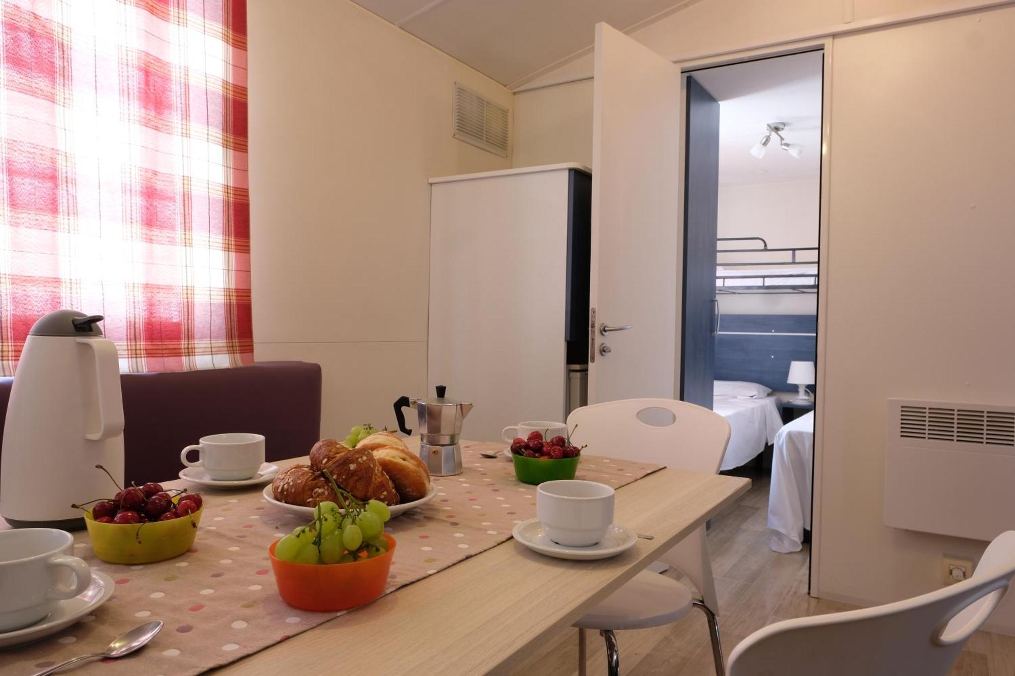 Happy Camp Mobile Homes In Camping Village Baia Paradiso Badesi Exterior photo